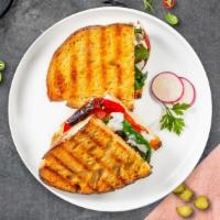 Meatless Panini · Mozzarella cheese, tomatoes, spinach, and sun dried tomatoes. on toasted bread.