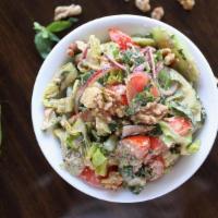 Qartuli Salata Nigvzit-Georgian Salad With Walnuts · Fresh tomatoes, cucumbers, red onions, green & red peppers, Romano leaves, with fresh basil,...