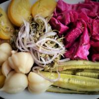Pickle Assortment · Cucumber, tomatoes, garlic, jonjoli (capers), red cabbage. Gluten free, Vegan, Keto Friendly.