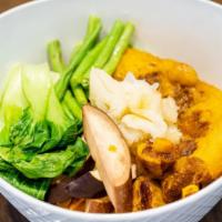 Kare Kare · Ox-tail, tendons and vegetables cooked in a peanut sauce.