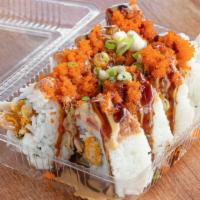 Tiger Maki · Shrimp tempura maki with spicy ahi, tobiko and green onion on top with spicy ahi sauce and u...