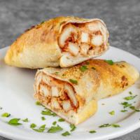 Chicken Roll · Pizza dough rolled with tender chicken strips, mozzarella cheese and tomato sauce.