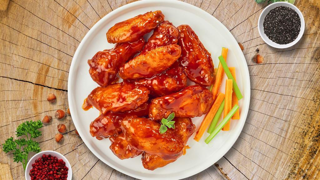 Buffalo Heat Wings · (Ten pieces) Fresh chicken wings breaded, fried until golden brown, and tossed in buffalo sauce. Served with celery, carrots, and bleu cheese.