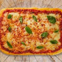 The Sicilian Squad Pizza · Mozzarella, marinara, fresh basil, and chopped garlic baked on a square focaccia-based crust.