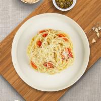 Carbonara Pasta (Spaghetti) · Classic Italian pasta dish made with fresh spaghetti, chopped onions, bacon, butter, egg yol...