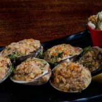 Whole Baked Clams (6) · Freshly baked clam top with signature seasoning and breadcrumb served with marinara sauce.