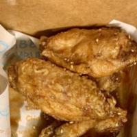 Tangy Chili Wings (5) · Crispy, sweet, tangy with flavors of soy, and garlic.