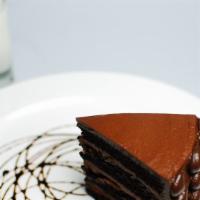 Death By Chocolate Cake · Sinfully decadent seven layer chocolate cake lavished with rich chocolate butter cream.