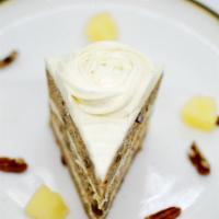 Hummingbird Cake · Moist & lovely with banana, pineapple & pecans. Layered with vanilla bean cream cheese frost...