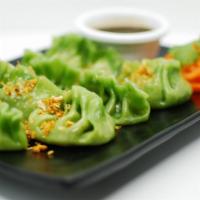 Vegetable Dumplings · Mix vegetables with black bean vinaigrette.