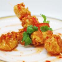 Golden Fritters · Minced shrimp & chicken with sweet chili sauce.