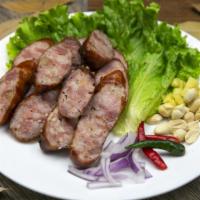 Thai Sour Pork Sausage · Peanuts, red onions, scallion, ginger & chili.