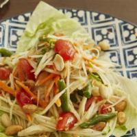 Isaan Green Papaya Salad · String beans, peanuts, cherry tomatoes, fresh chili, in chili-lime dressing. Spicy.