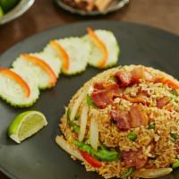 Bacon Fried Rice · Bacon, egg, basil, onion, bell pepper, snap peas, Chinese broccoli & chili.