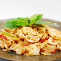 Drunk Man Noodles · Spicy. Broad noodles, chicken, shrimp, squid stir-fried with spicy basil chili & egg.
