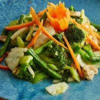 Garden Delight · Sauteed vegetables with garlic and sesame oil. Vegetarian. Vegan.