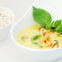 Green Curry · Spicy. Sweet & spicy curry with eggplant, bamboo shoots & basil.