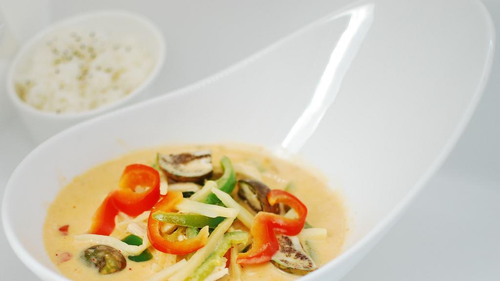 Red Curry · Spicy. Spicy, little salty curry with bamboo shoots, basil & bell peppers.