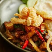Kao Pao Moo Krob · Crispy pork belly, Thai chili, holy basil, garlic, son in law egg & fish sauce chili dip.