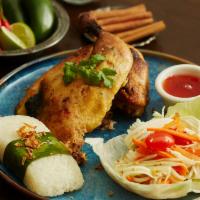 Char-Grilled Chicken · Marinated half chicken served with green papaya salad and coconut sticky rice.