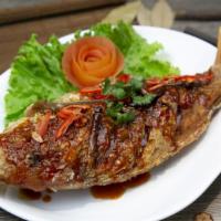 Tamarind Whole Fish · Spicy. Crispy fish with our signature tamarind sauce.