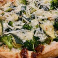Veggie Lovers Pizza · White base, yellow squash, cauliflower, zucchini, cherry tomatoes, Brussels, Fontina, Pecorino