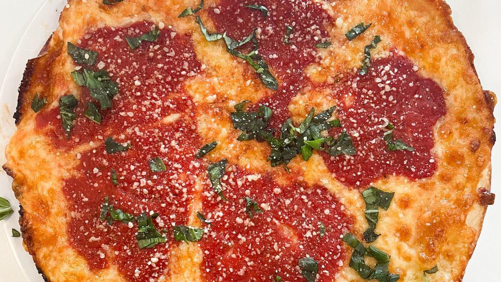 Grandma Pie · Shredded cheese, our famous sauce, chopped basil and grated parmesan cheese