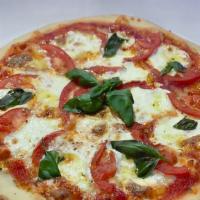 Margarita Pie · Fresh mozzarella cheese, sliced tomato, fresh basil and extra virgin olive oil drizzle.