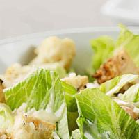 Caesar Salad   · Romaine Lettuce, Croutons, Parmesan Cheese & Caesar Dressing.