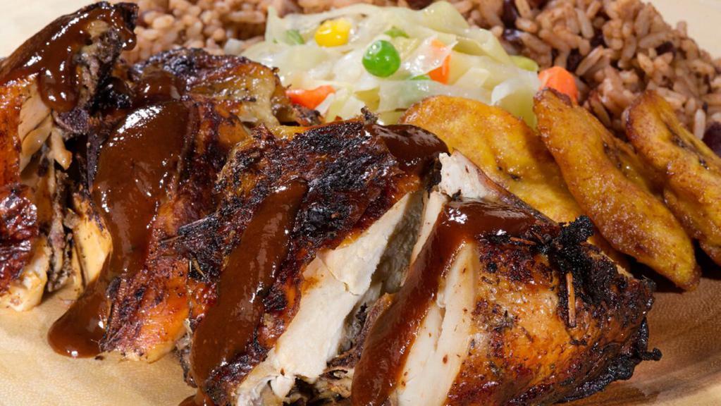 Jerk Chicken · Served with rice and peas or white rice and steamed vegetable.