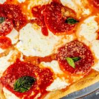 Sophia Lauren Pizza Slice · Tomatoes, fresh mozzarella cheese, garlic, basil.