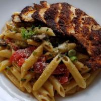 Rasta Pasta · Spicy. Sautéed mushrooms, roasted red peppers, scallions, and Cajun cream sauce over penne w...