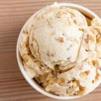 Maple Walnut · Vermont maple syrup ice cream with walnut halves.