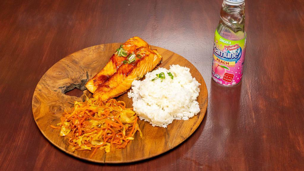 Salmon Teriyaki · Pan seared salmon with a light teriyaki glaze; served with a side of rice and veggies.