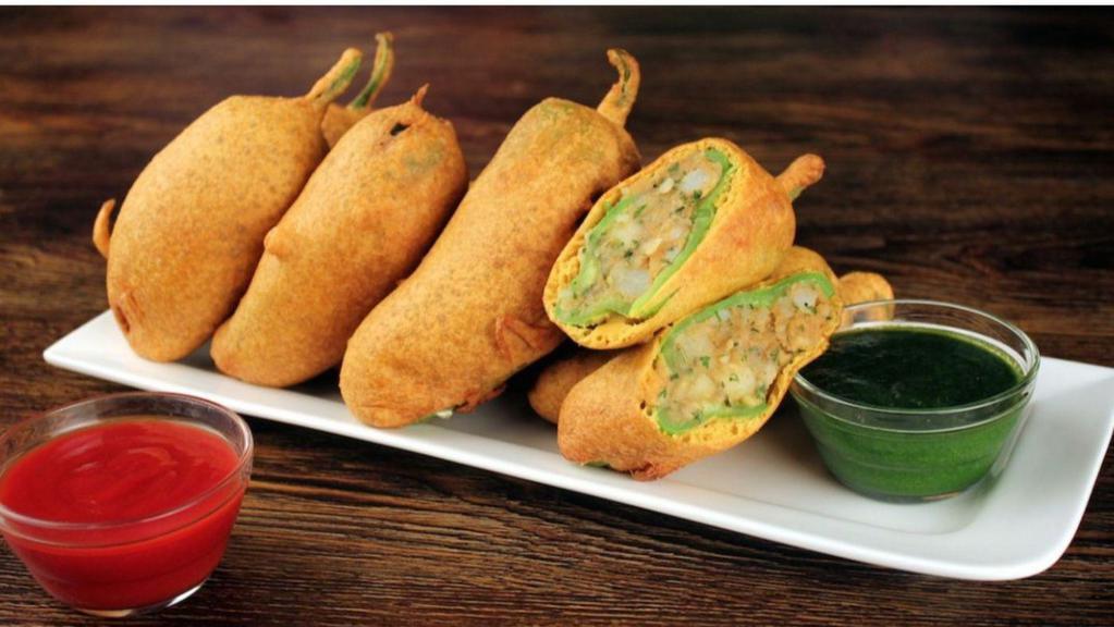 Bindass Mirchi Bhajiya · Long hot kali mrichi stuffed with tamarind and potatoes spices.