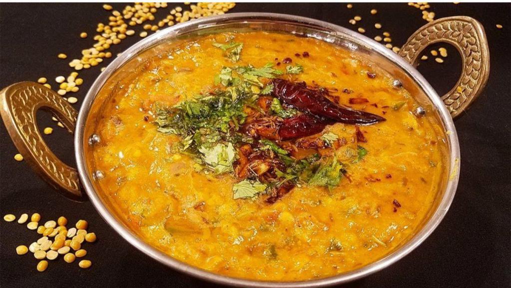 Dal Tadka · Cooked lentils which are lastly tempered with ghee fried spices and herbs.