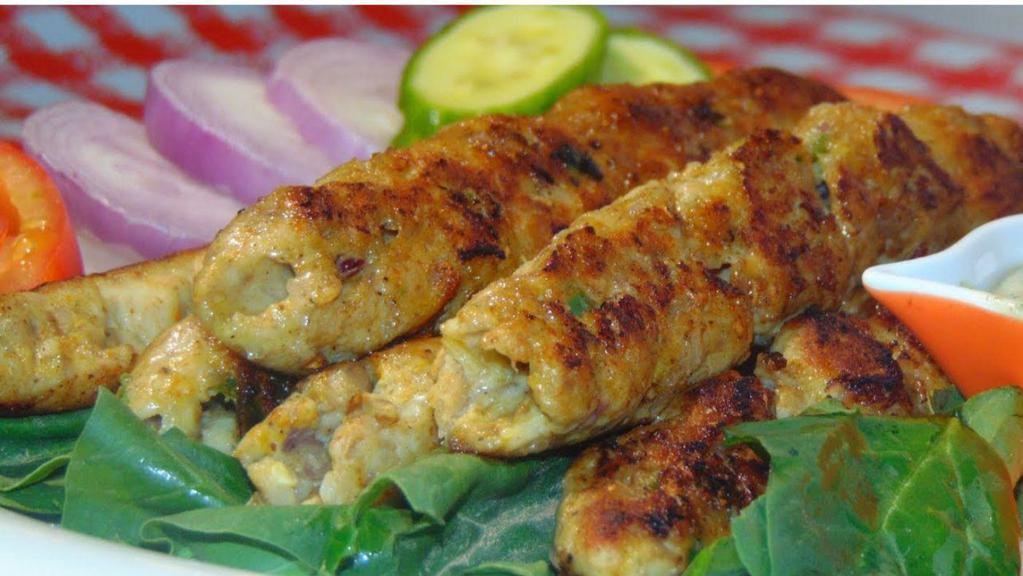 Chicken Seekh Kabab · Spiced flavorful chicken mince shaped onto skewers and grilled to perfection.