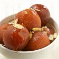 Gulab Jamun · A classic Indian sweet made with milk solids (shaped as a balls), sugar, rose syrup and card...