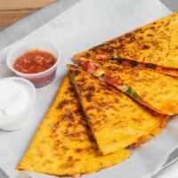 Bbq Chicken Quesadilla · Grilled BBQ chicken, red onions, pepper jack, and cheddar cheese.