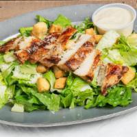 Traditional Caesar Salad · Crisp romaine, Parmesan cheese, and croutons.