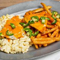 Spicy Chicken Plate · Grilled chicken breast with Buffalo sauce, fries, and macaroni salad, topped with jalapenos....