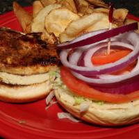 Chicken Sandwich · Served on a soft roll with lettuce, tomato, and onion.
