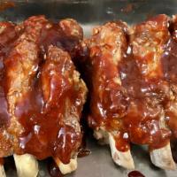 1/4 Rack Rib Dinner · St Louis Ribs or Beef Ribs Grilled and BBQ to perfection!