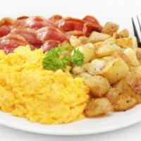 Home Fries With Bacon And Eggs · Delicious hand-cut home fries with crispy bacon and eggs.