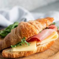 Croissant With Sausage, Egg And Cheese Sandwich · Crispy soft croissant with sausage, egg and cheese.