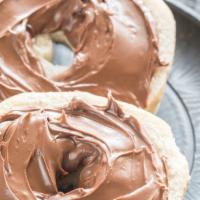 Bagel With Nutella And Jelly · Fresh bagel with nutella and jelly.