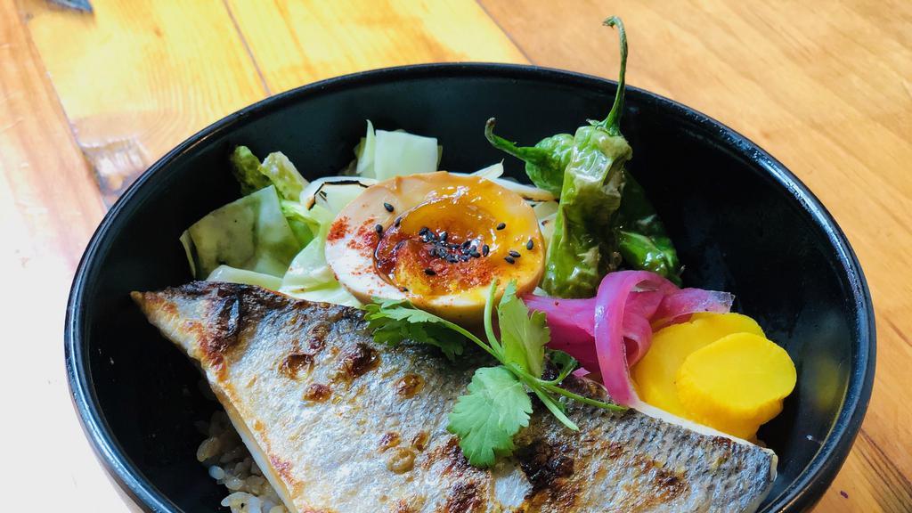 Roasted Fish Bento · Your choice of fish grilled to perfection with brussels sprouts, napa cabbage, smoked egg, house made pickles over rice.