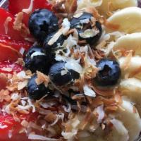 Acai Bowl · Acai base is made with acai, soy milk, blueberries, strawberries, and bananas. Topped with f...
