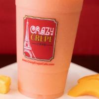 Tropical Passion Smoothie · Mango juice, strawberry, banana, and pineapple sherbet.