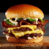 Hell'S Kitchen Burger · 1/2 lb. Fresh Angus Beef, Jalapeño Ranch, Jalapeño Peppers, Bacon, and American Cheese
